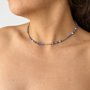 Choker de acero quirúrgico dorado con mostacillas azules