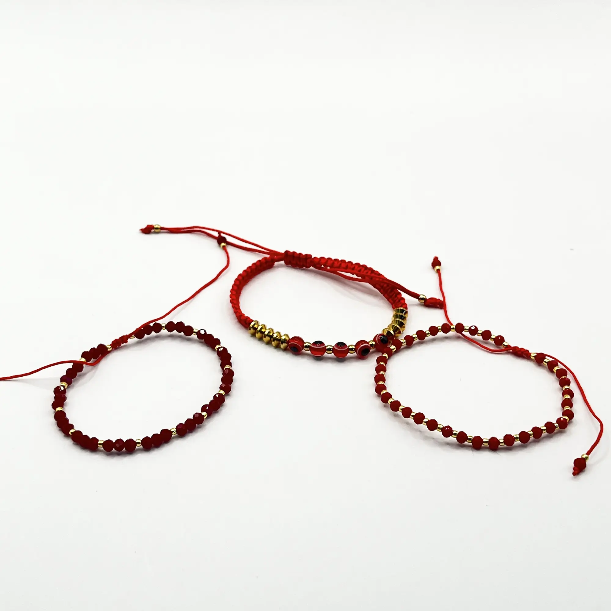 Set de 3 pulseras de acero quirúrgico con hilo ajustable 1