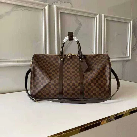 Bolso de viaje cuadrillé marrón
