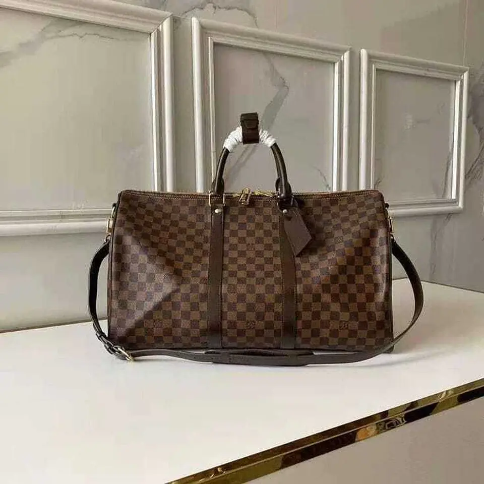 Bolso de viaje cuadrillé marrón 1