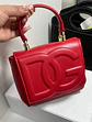 Bolso con relieve en el frente - Miniatura 1