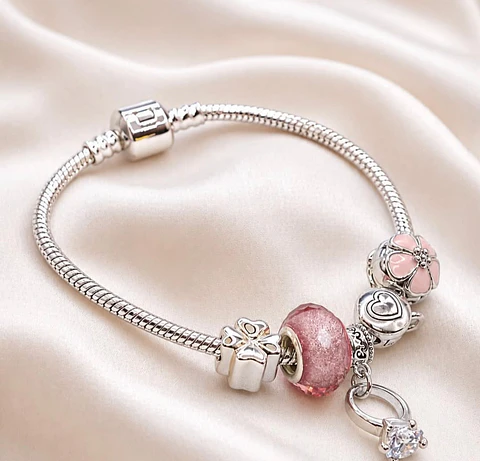 Pulsera Baño Oro Blanco con Accesorios Rosados