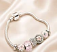 Pulsera Baño Oro Blanco con Accesorios Rosados - Miniatura 1