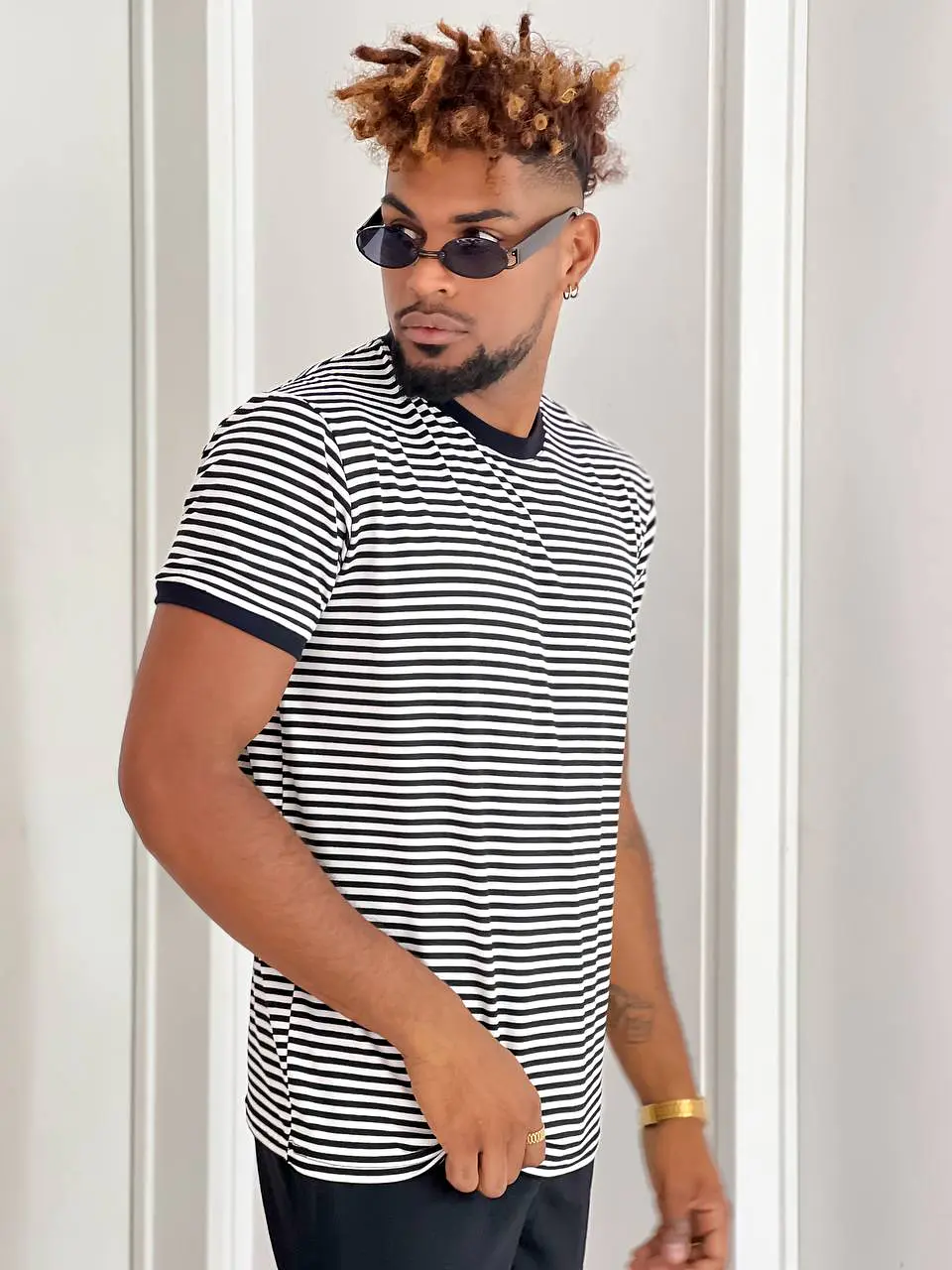 Raya remera rayada de hombre 4