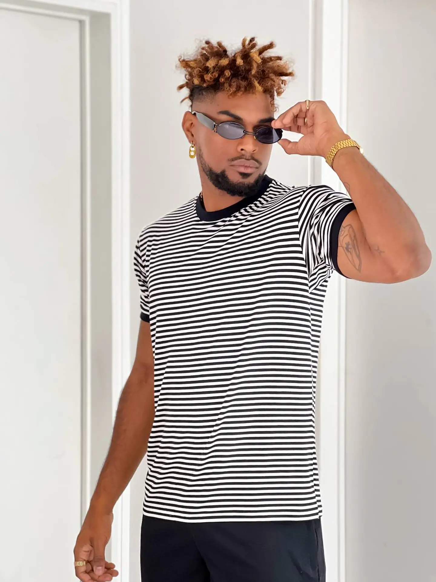 Raya remera rayada de hombre 5