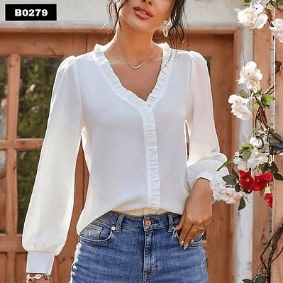 Blusa de moda suelta con adorno al frente