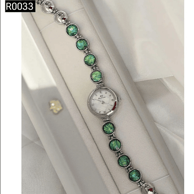 Reloj plateado con pulso con Diamantes verdes