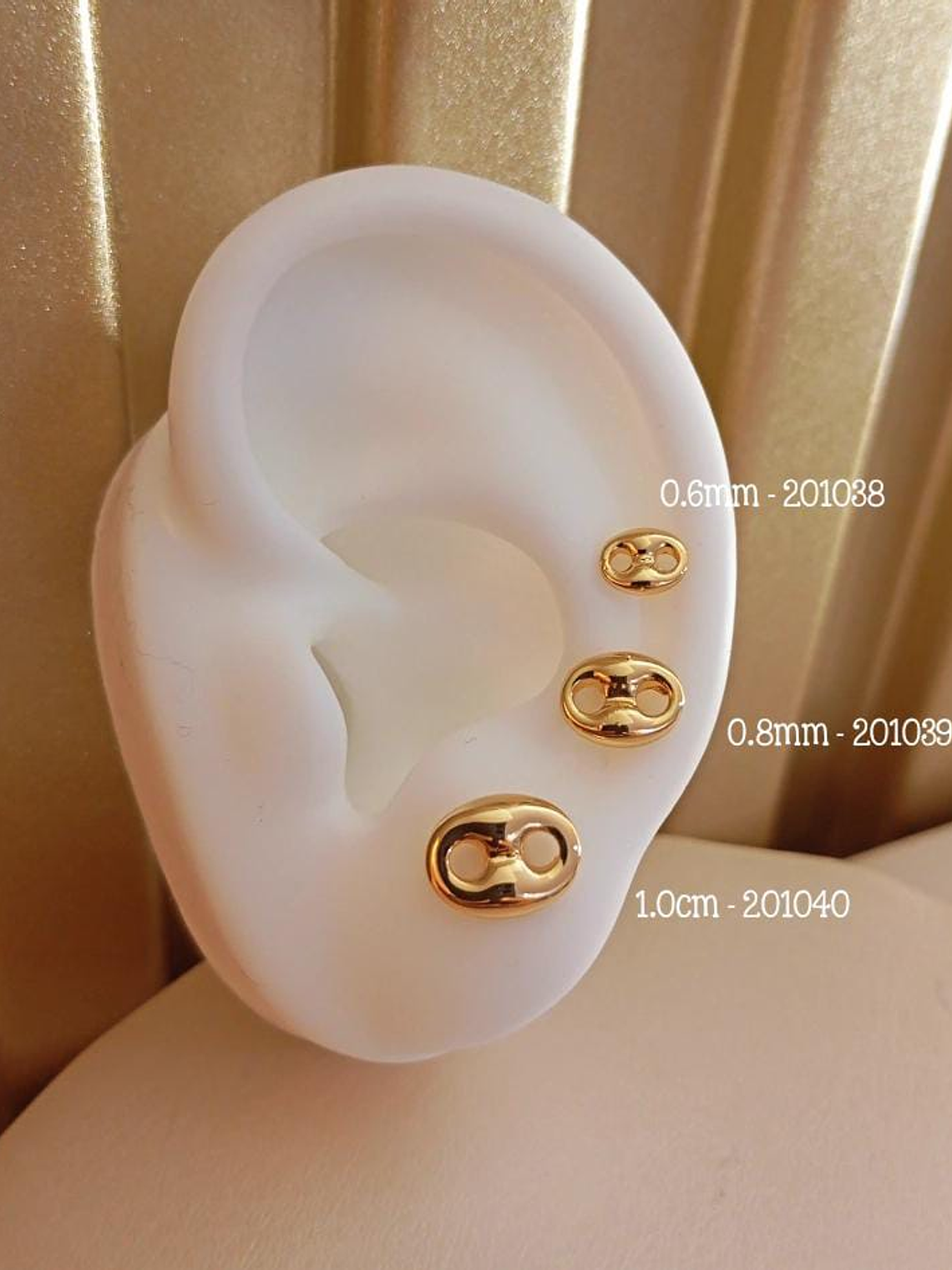 TOPOS GUCCI - ORO LAMINADO  1