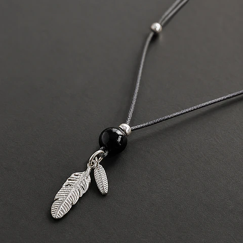 Collar Ónix Plumas