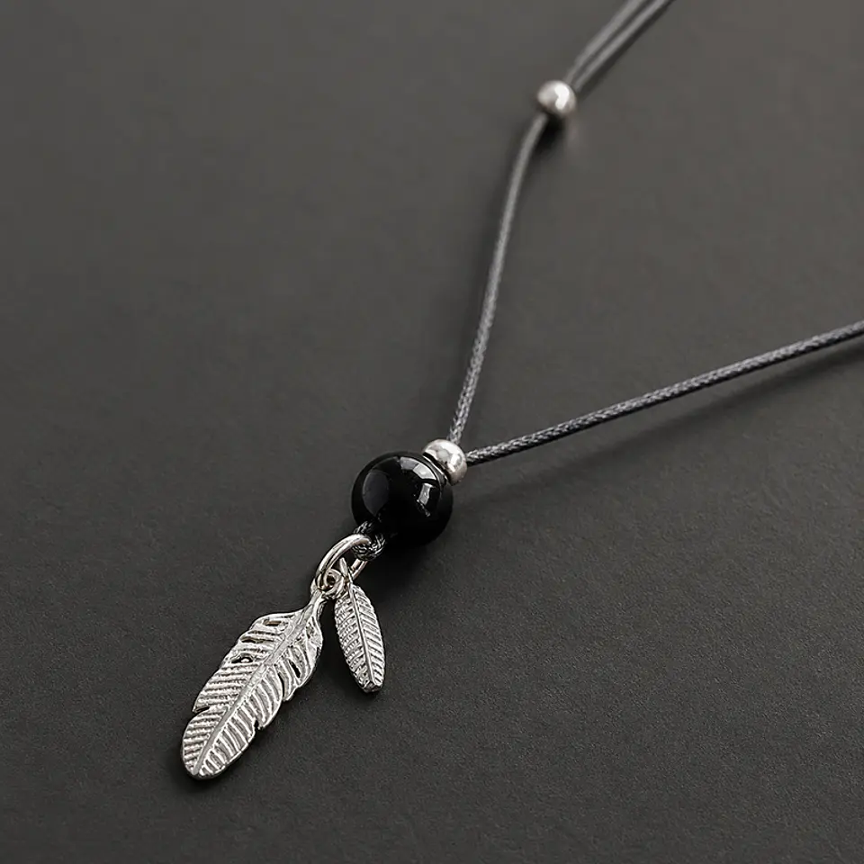 Collar Ónix Plumas 1