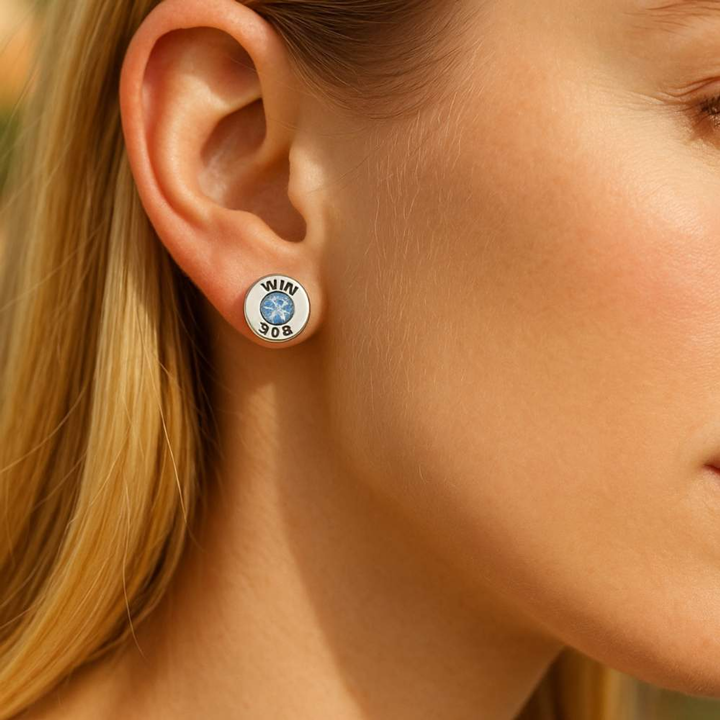 Pendientes casquillo de bala con circonita azul  3