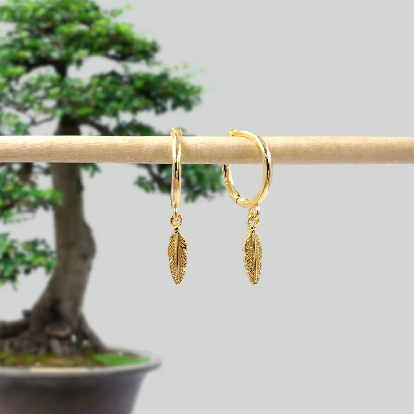 Argollas Pluma | Plata 925 baño de oro 18k 4