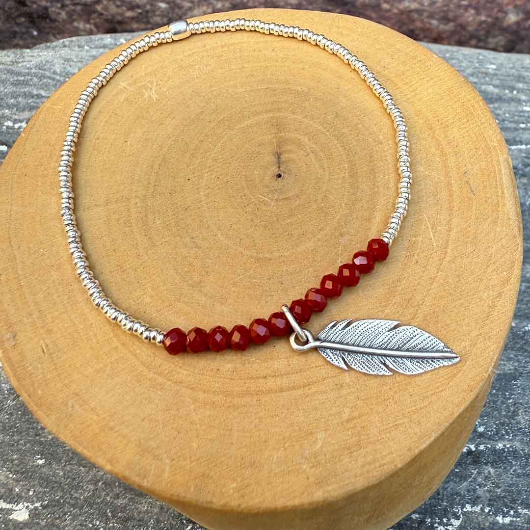 Pulsera elástica Pluma de plata 950 y mostacillas de plata 1000 y piedras  1
