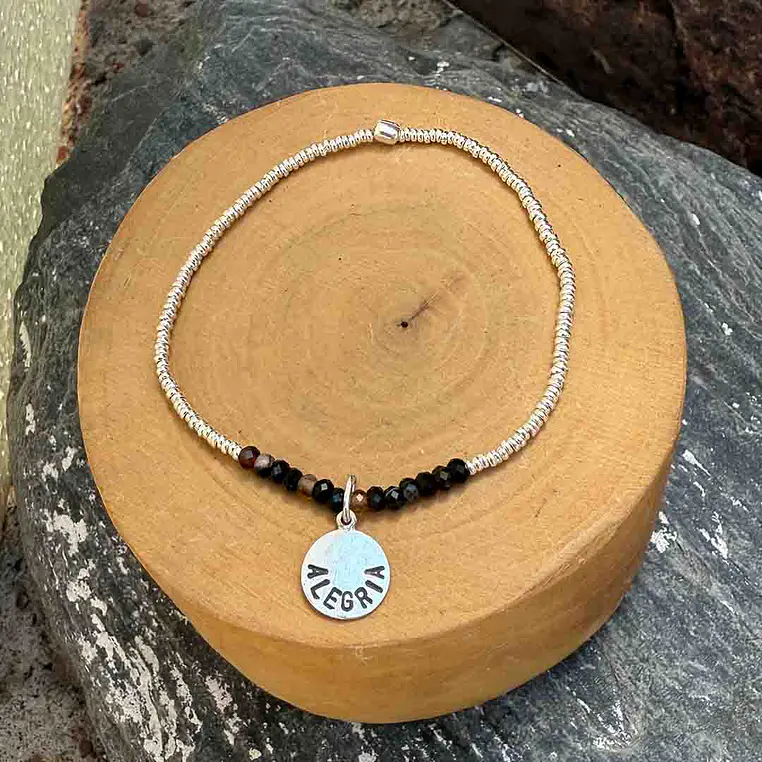 Pulsera elástica medalla Alegría de lata 950 y mostacillas de plata 1000 y piedras 2