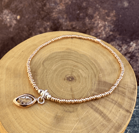 Pulsera Elástica con Mostacillas de Cobre y Plata 1000 con centro de Herkimer y Cobre