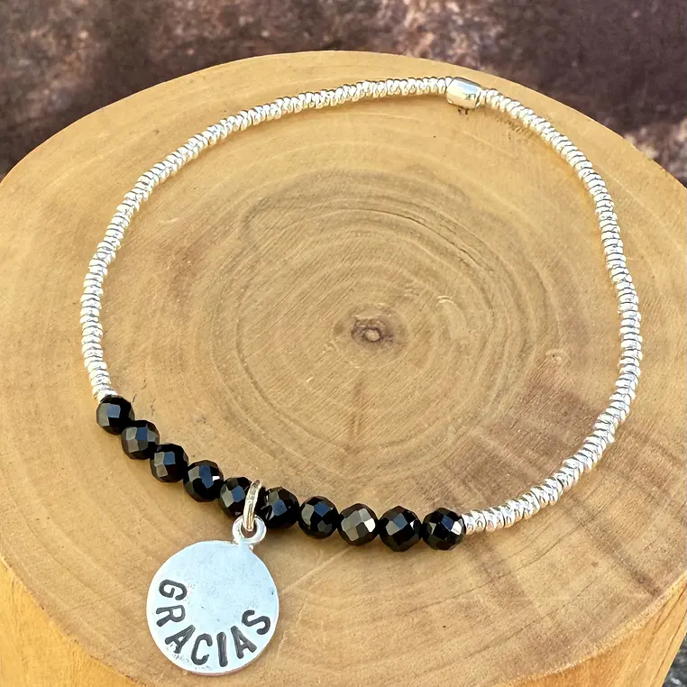 Pulsera elástica Gracias de plata 950 con mostacillas de Plata 1000 y Turmalina Negra 1