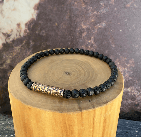 Pulsera Elástica con Tubo de Cobre Texturizado Acompañado de Mostacillas de 4 mms de Piedra Volcánica