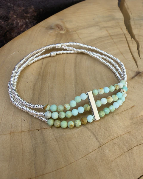 Pulsera elástica de 3 corridas de mostacillas de plata 1000 y piedras