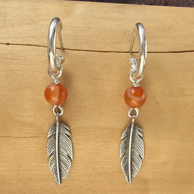 Aros con  Plumas chicas de Plata 950 y Piedras 1