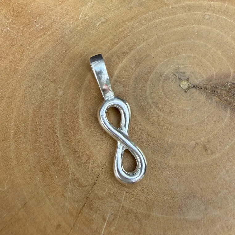 Medalla infinito de plata 950 1