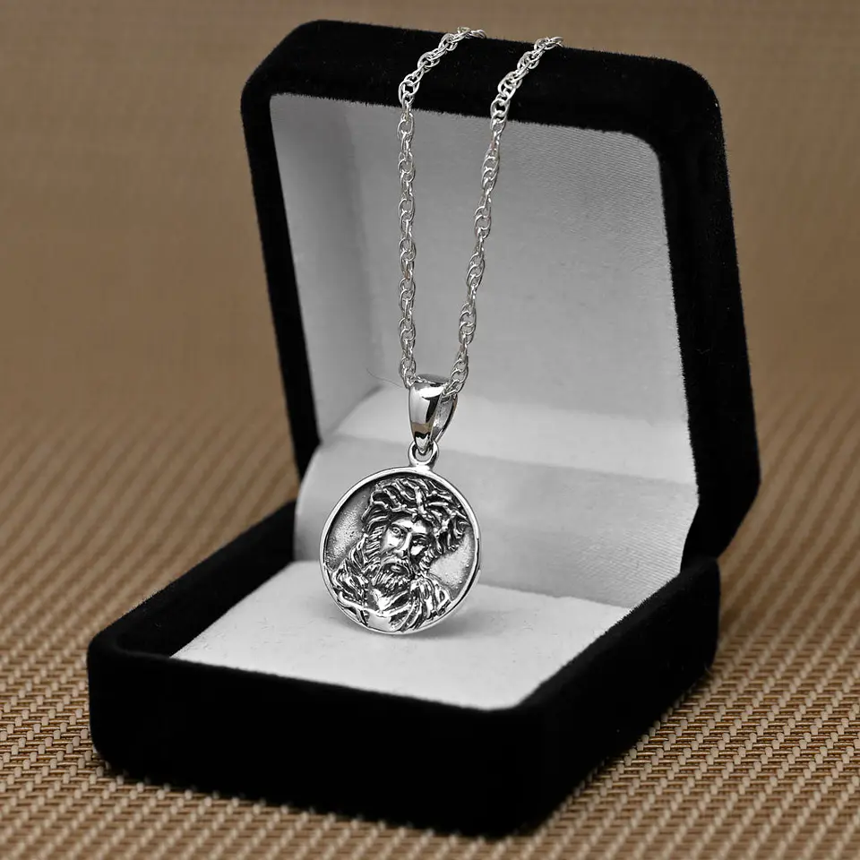 Colgante rostro de cristo con corona de espinas en plata 925 1