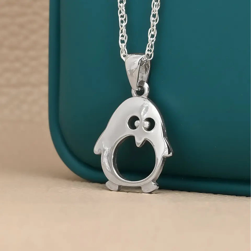 Colgante pinguino en plata 950 1