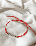 PULSERA ROJA MOSTACILLA PLATA