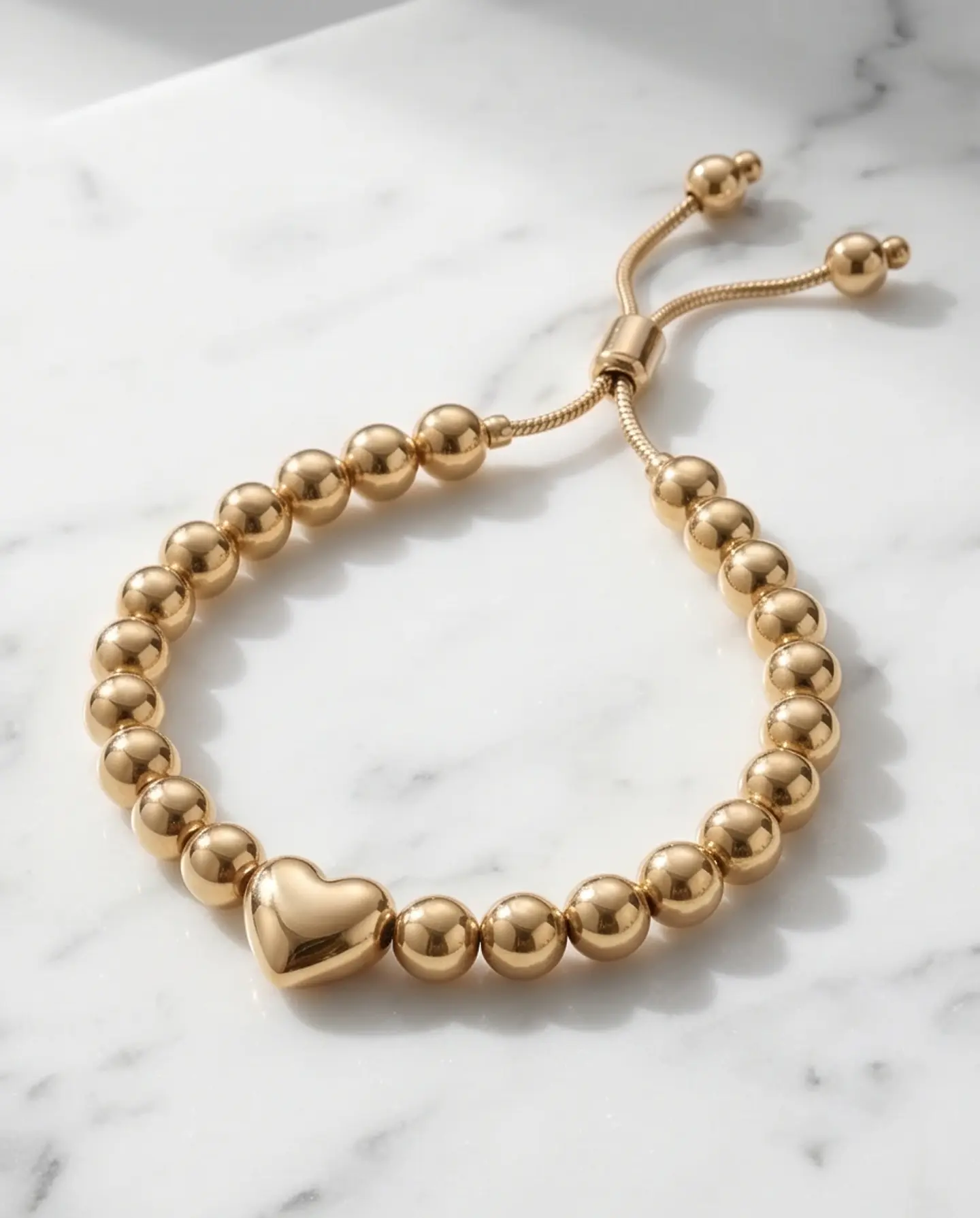 Pulsera de bolitas con corazón  1