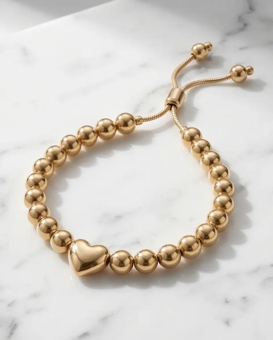 Pulsera de bolitas con corazón  1