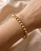 Pulsera de bolitas con corazón  - Miniatura 2