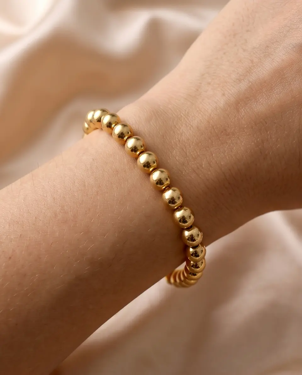Pulsera de bolitas con corazón  2