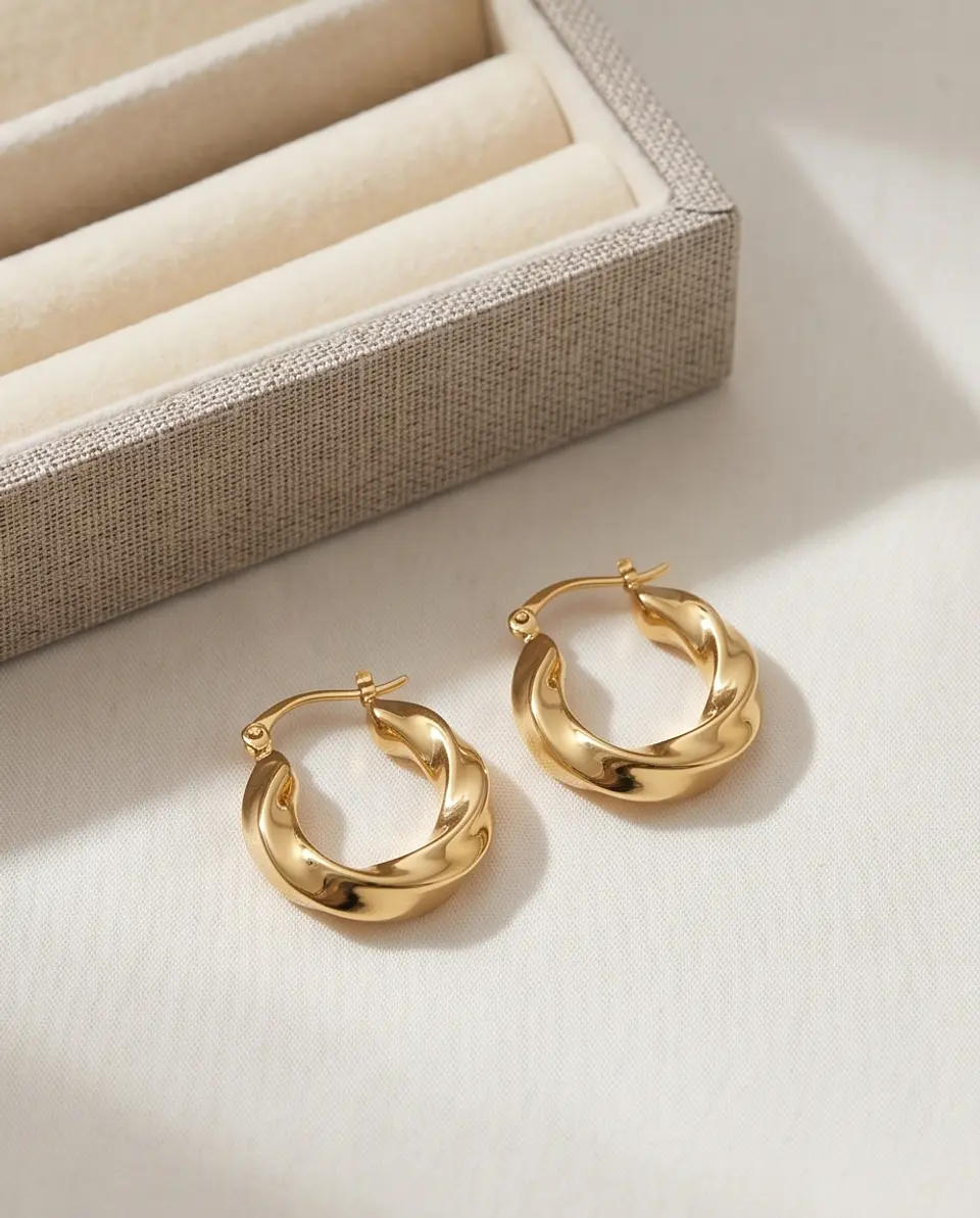 Argollas Infinity Twist Gold 2