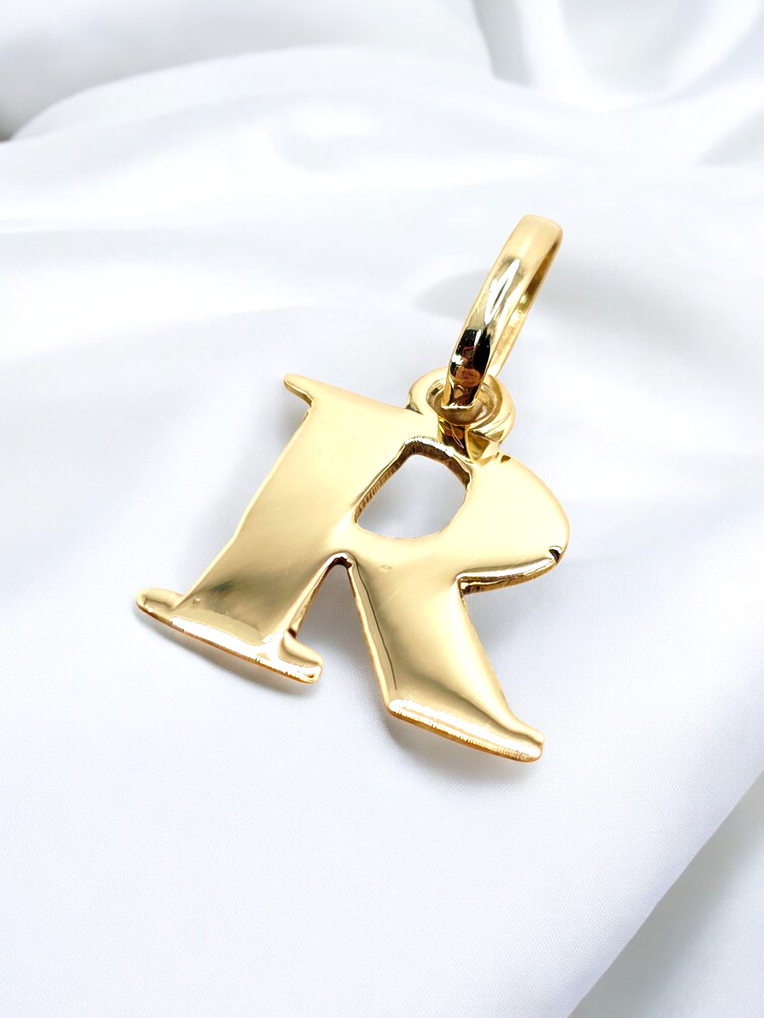 Colgante inicial 2 cm Oro 18k 9