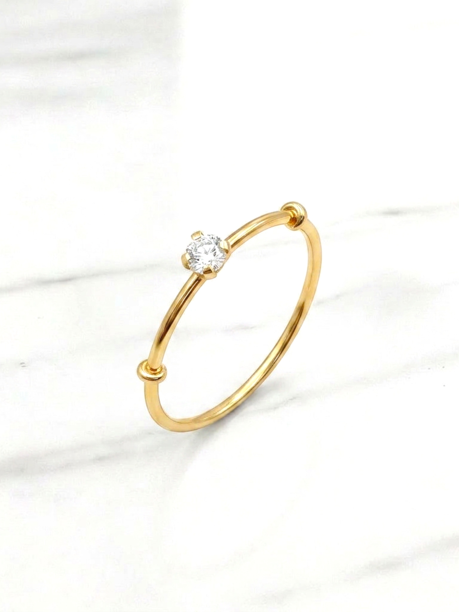 Anillo solitario grifas circón Oro 18k 4