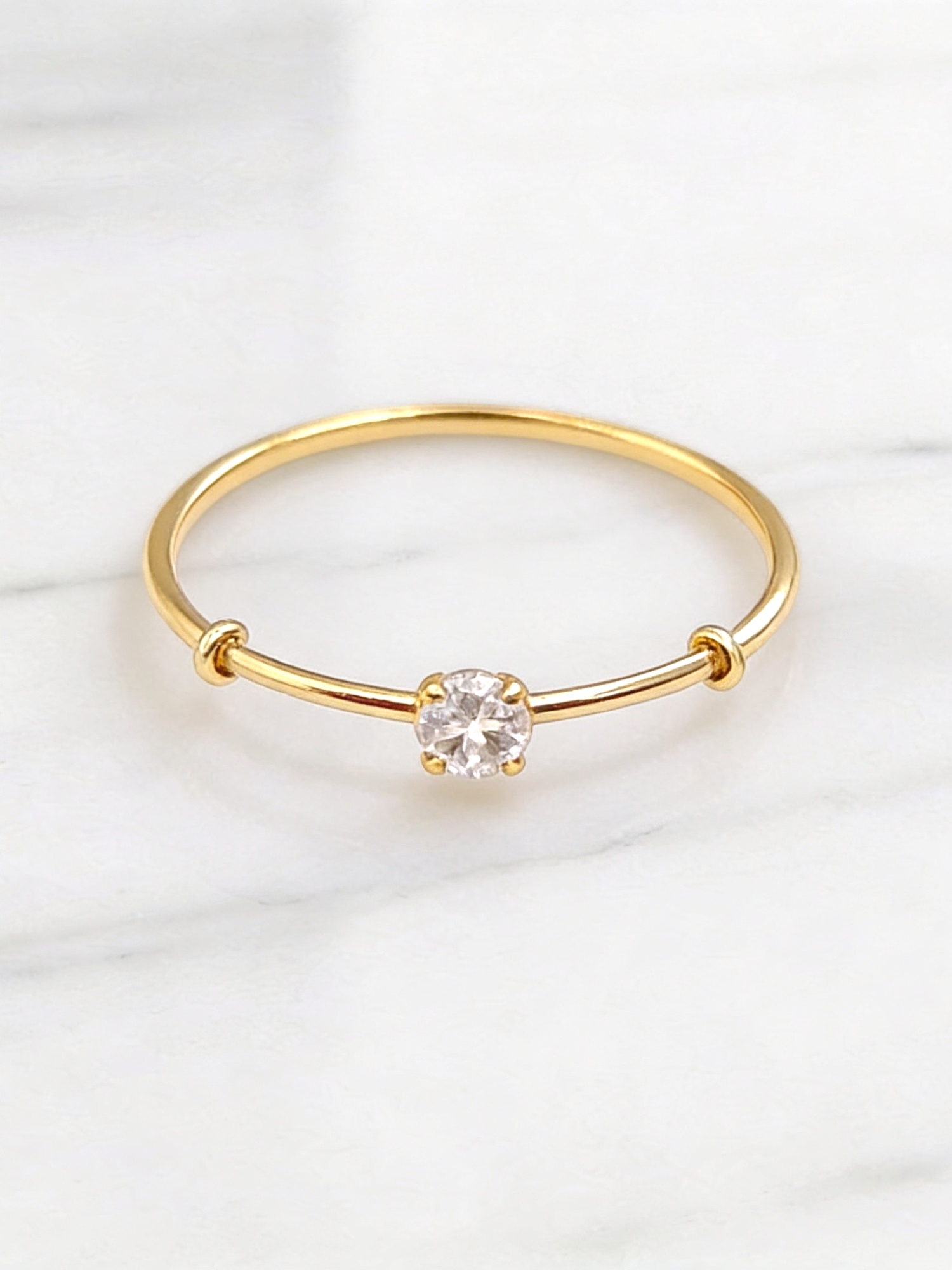 Anillo solitario grifas circón Oro 18k 5