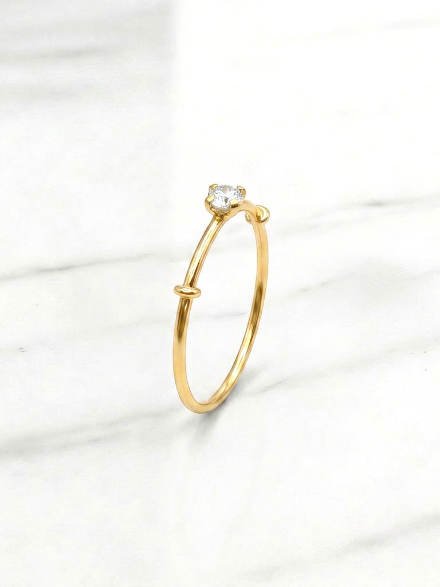 Anillo solitario grifas circón Oro 18k 2