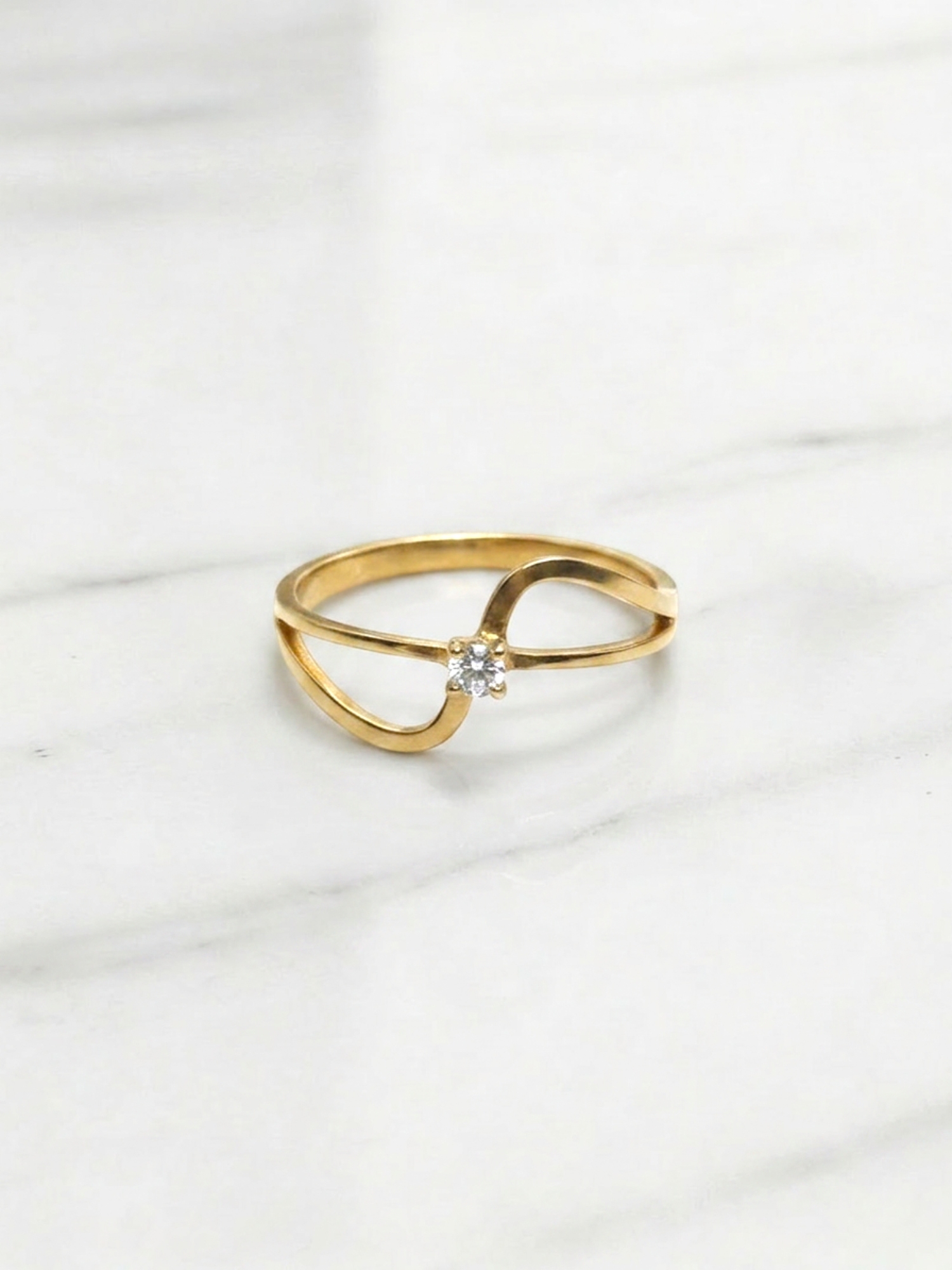 Anillo infinito circón Oro 18k 2