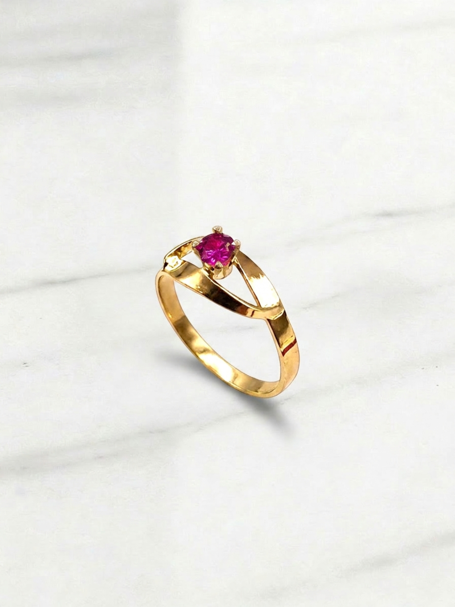 Anillo entrelazado 4 grifas rubí Oro 18k 2