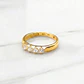 Anillo medio cintillo grifa con circones Oro 18k - Miniatura 2