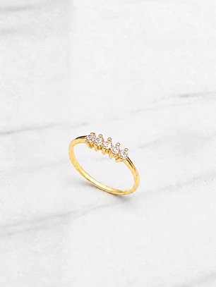 Anillo medio cintillo 5 circones Oro 18k