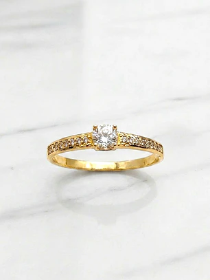 Anillo solitario cintillo circónes Oro 18k