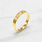 Anillo medio cintillo engastado tres circónes Oro 18k - Miniatura 1