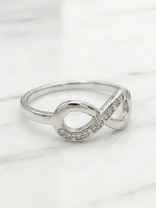 Anillo eterno circónes Oro blanco 18k