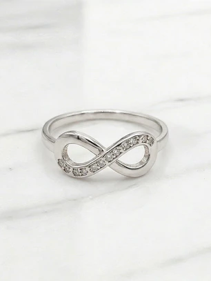 Anillo eterno circónes Oro blanco 18k