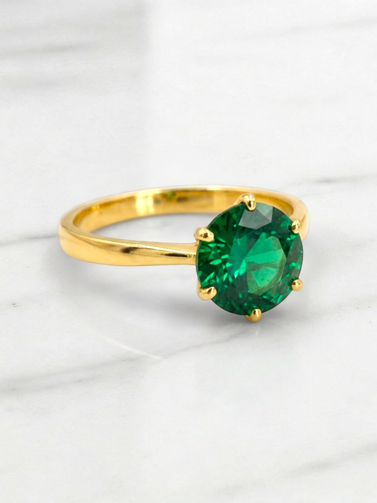 Anillo solitario esmeralda 6 grifas Oro 18k 1