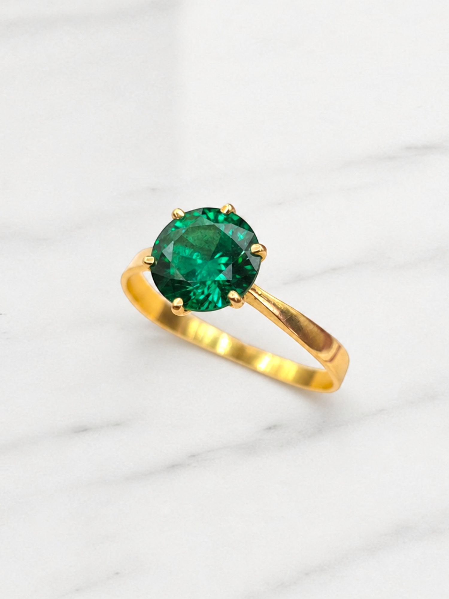 Anillo solitario esmeralda 6 grifas Oro 18k 4