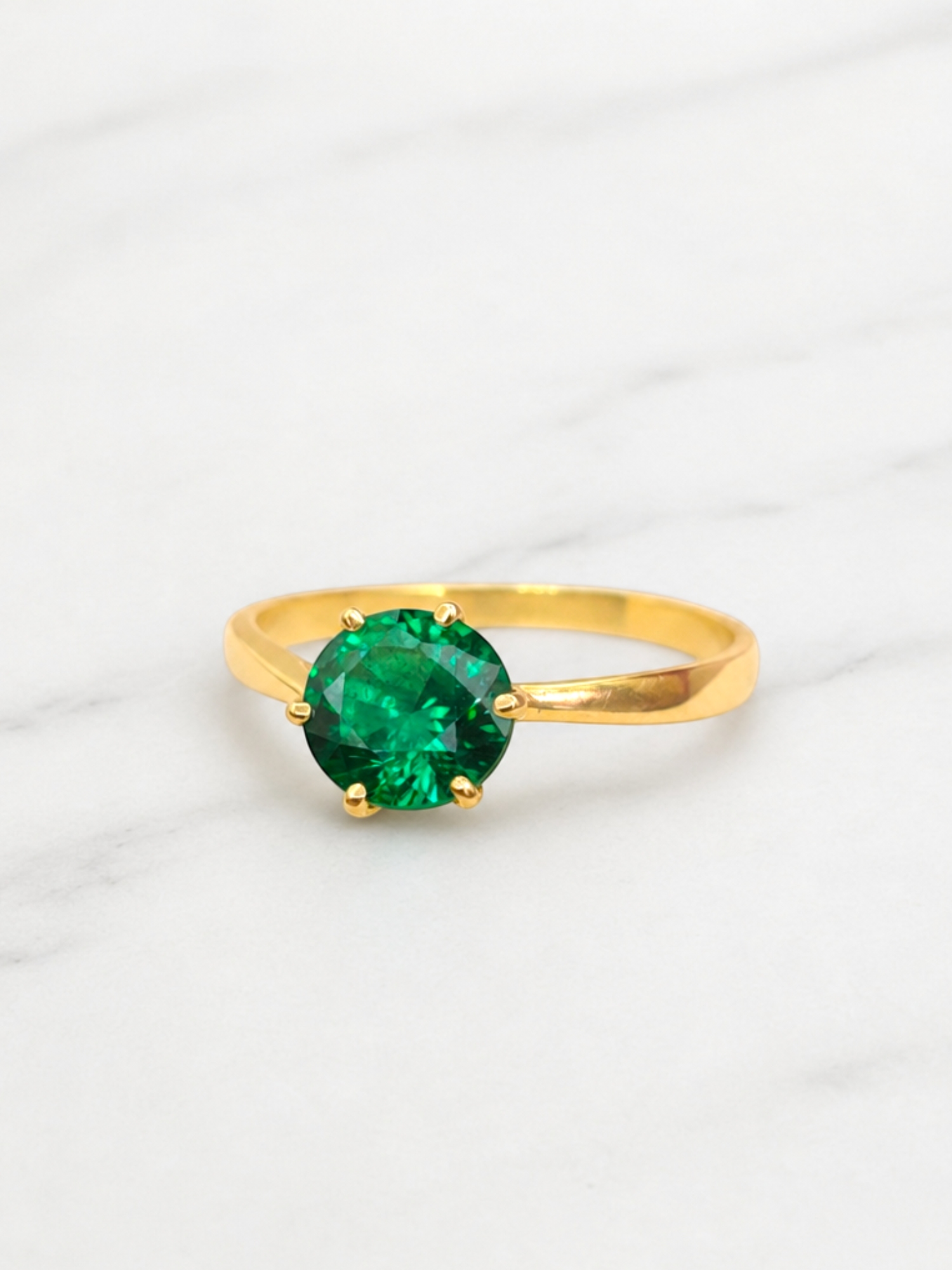 Anillo solitario esmeralda 6 grifas Oro 18k 2