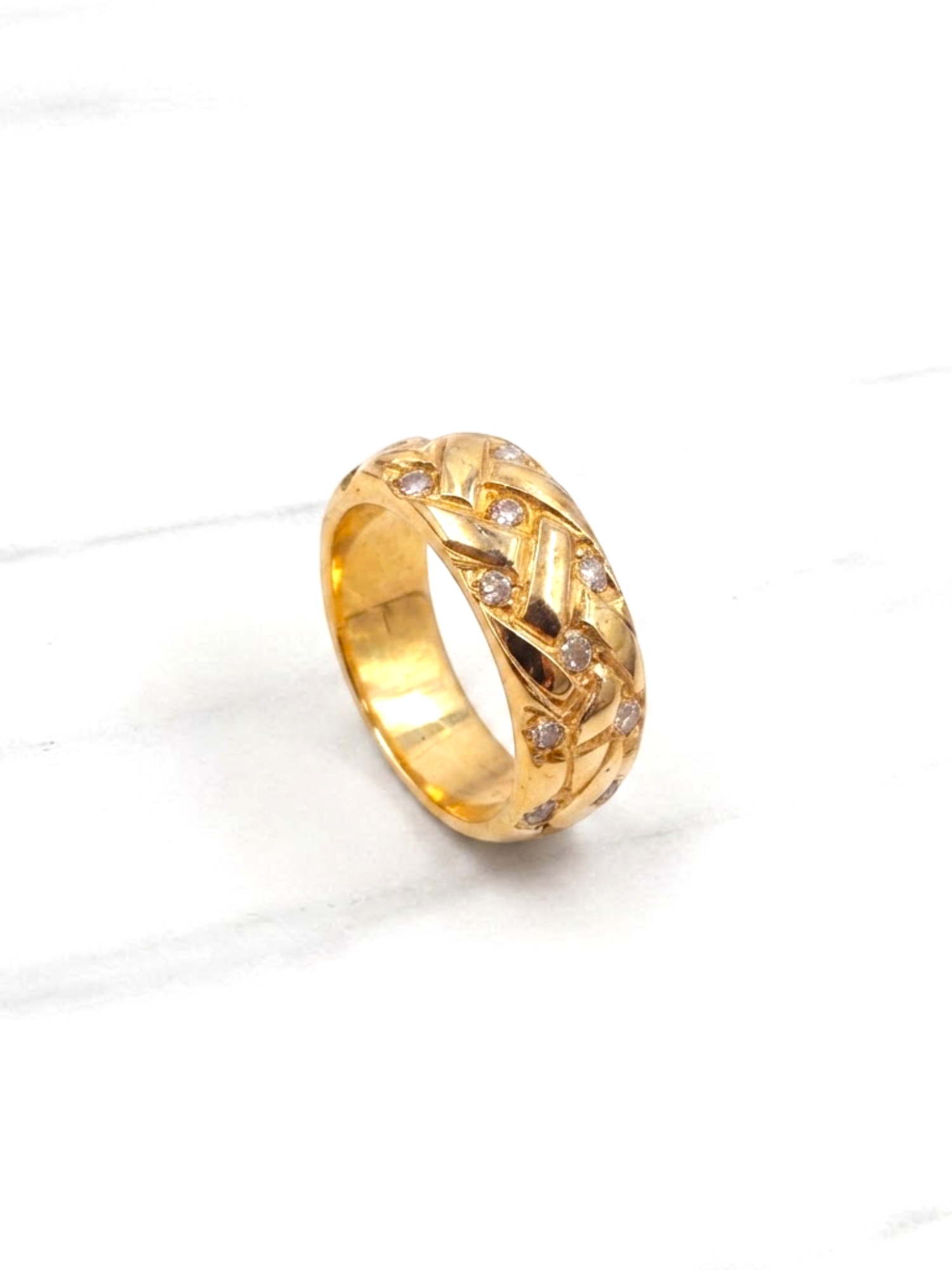 Anillo lazos y circón Oro 18k 1