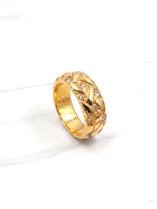 Anillo lazos y circón Oro 18k