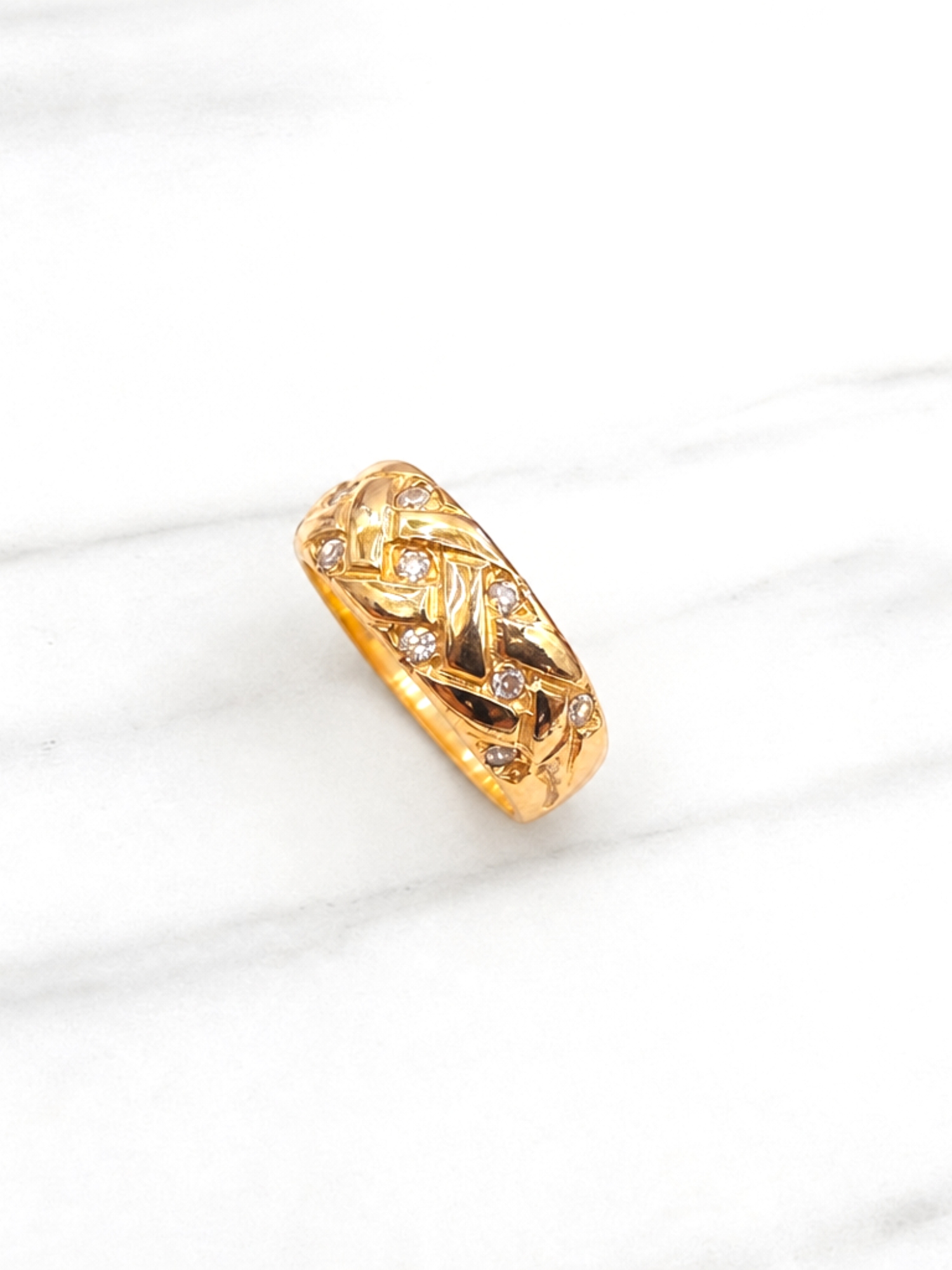 Anillo lazos y circón Oro 18k 5